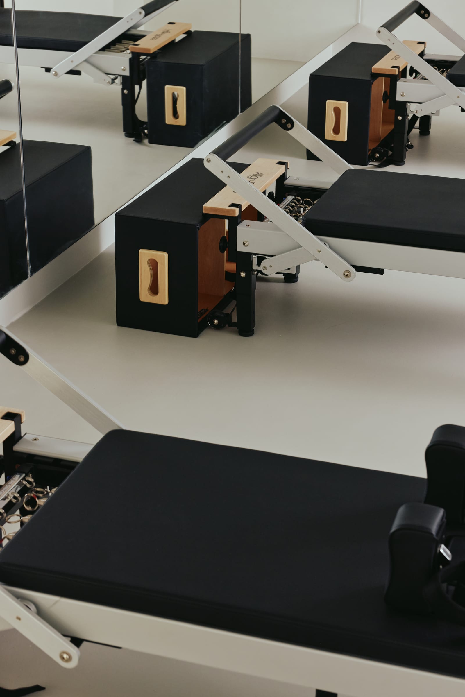 Somma Studio reformer room with six reformers and studio props